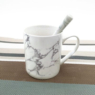 Elegant ceramic ceramic mug with decals (1)