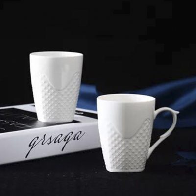 Fancy ceramic white embossed mug (5)