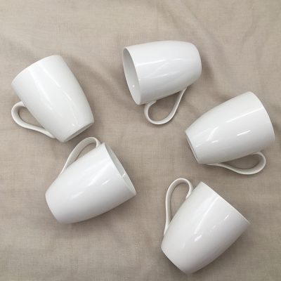 Small round ceramic white mark cup (1)