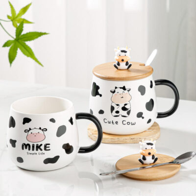 ceramic coffee mug with lid and spoon