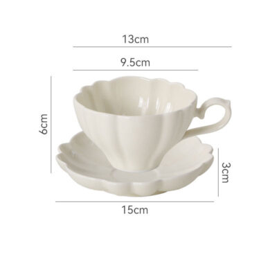 ceramic tea mug with saucer and spoon