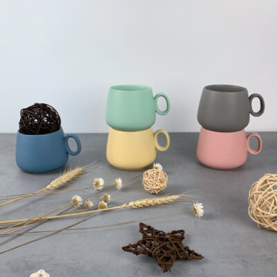 Handmade ceramic mug with creative color