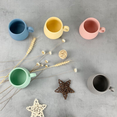 Handmade ceramic mug with creative color