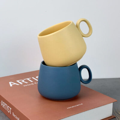 Handmade ceramic mug with creative color